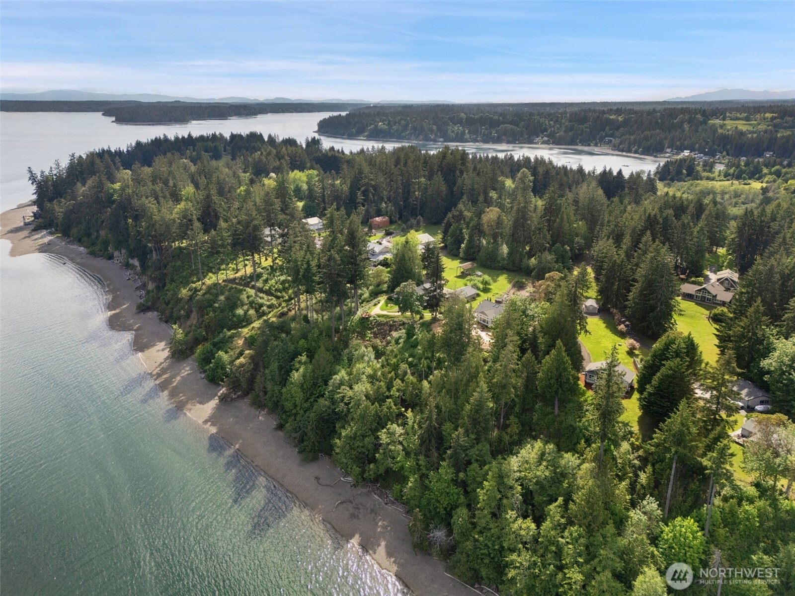 211 East Vineyard Crest Road Grapeview, WA 98546 - Photo 2 of 40 a view of a lake with a mountain