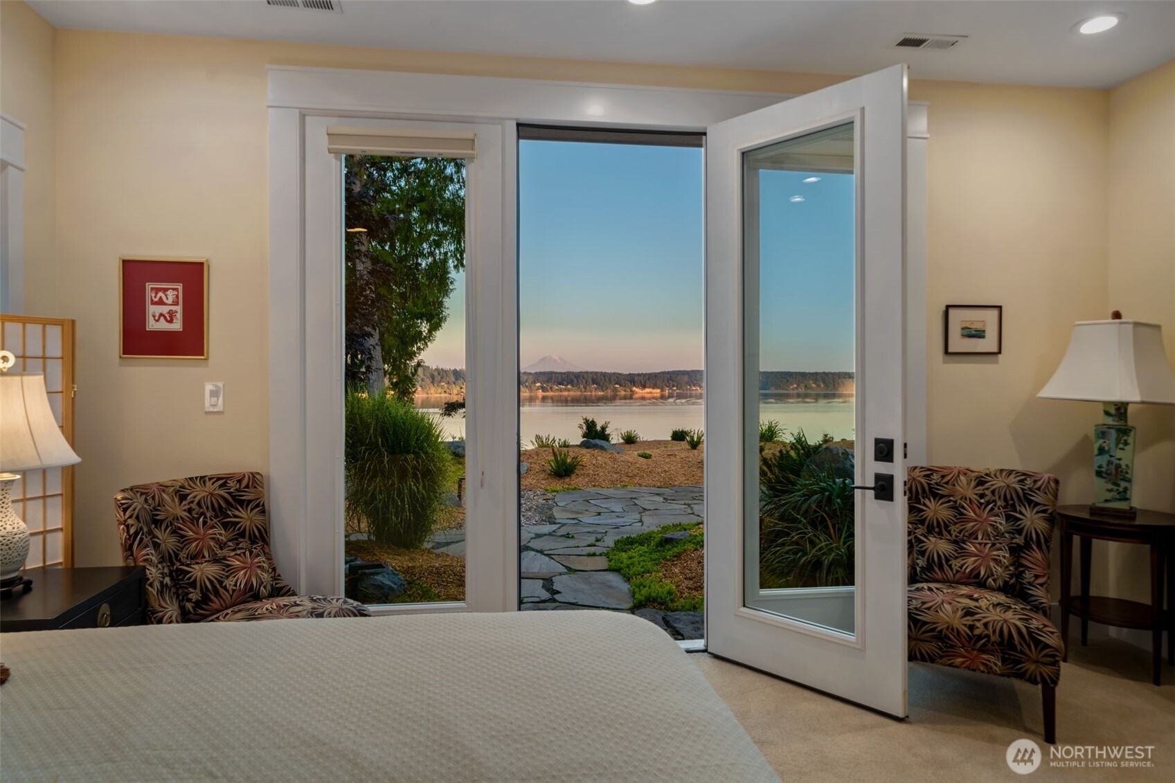 211 East Vineyard Crest Road Grapeview, WA 98546 - Photo 24 of 40 a bedroom with furniture and large window