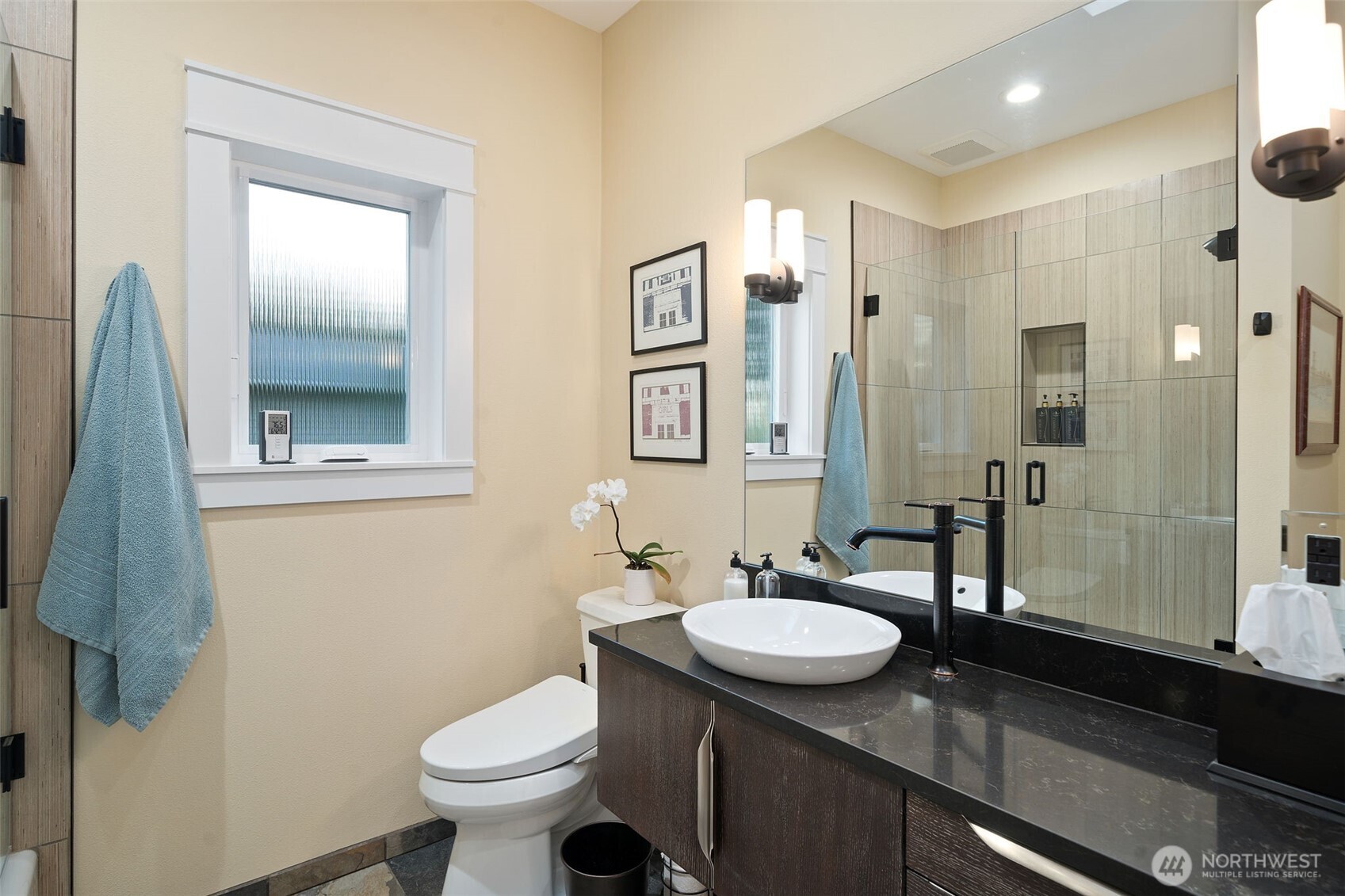 211 East Vineyard Crest Road Grapeview, WA 98546 - Photo 26 of 40 a bathroom with a granite countertop sink toilet and shower