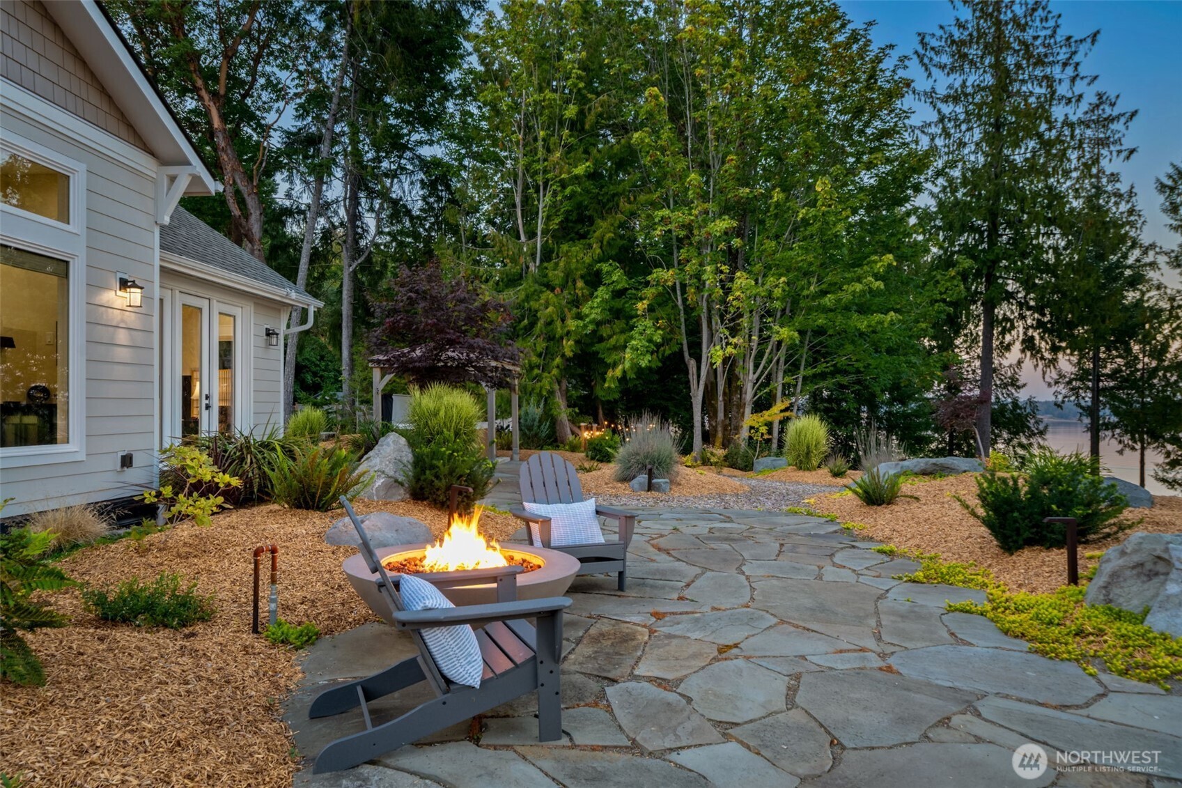211 East Vineyard Crest Road Grapeview, WA 98546 - Photo 7 of 40 a view of a backyard with sitting area