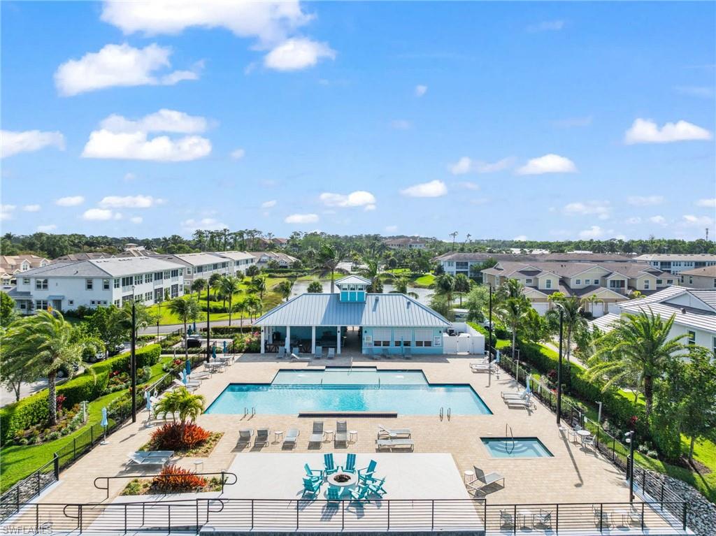 4619 Arboretum Circle, Unit 101 Naples, FL 34112 - Photo 41 of 41 a view of a city with lots of buildings in the background