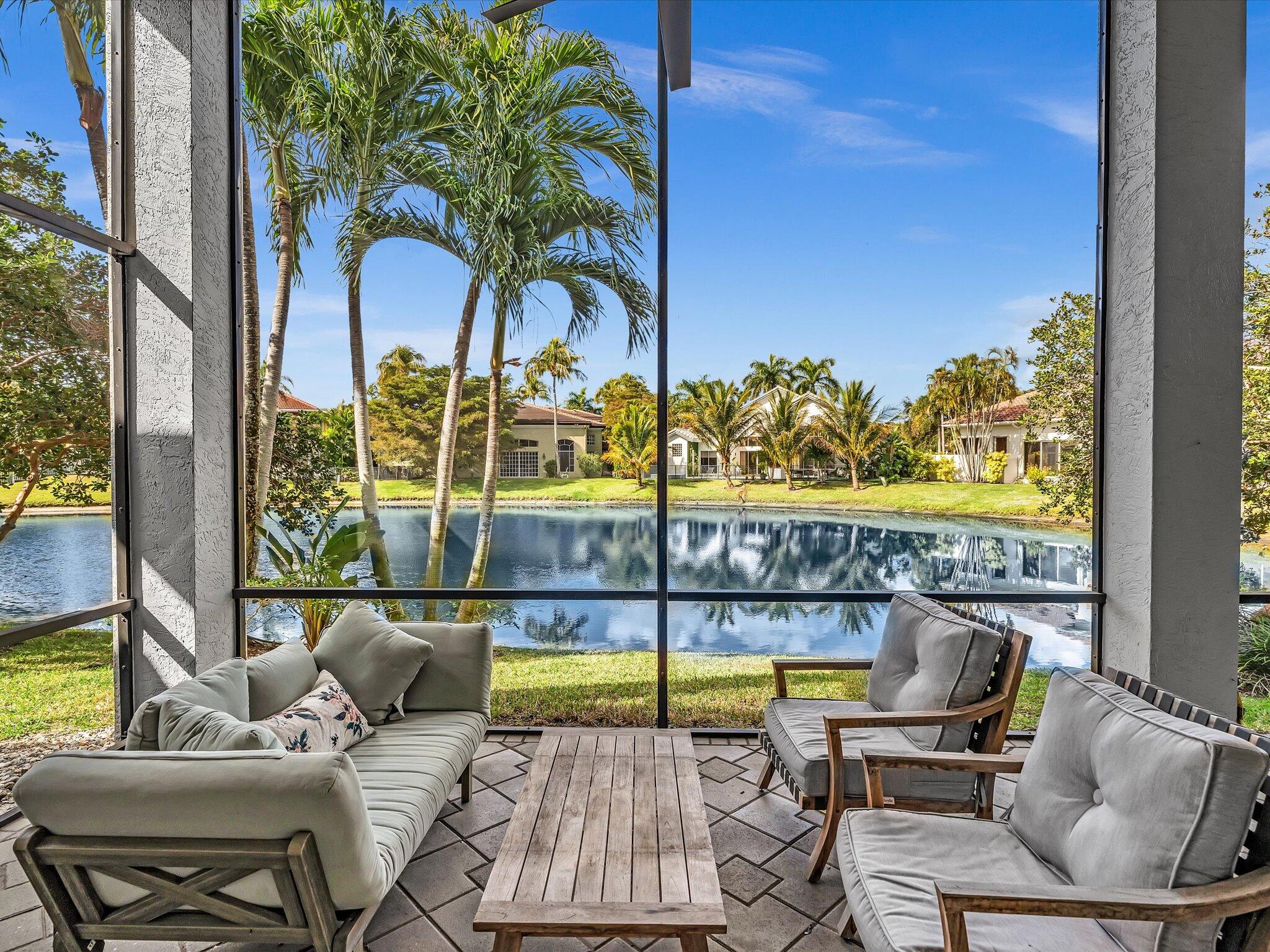 6485 Northwest 32nd Way Boca Raton, FL 33496 - Photo 15 of 54 a view of a chairs and table in patio