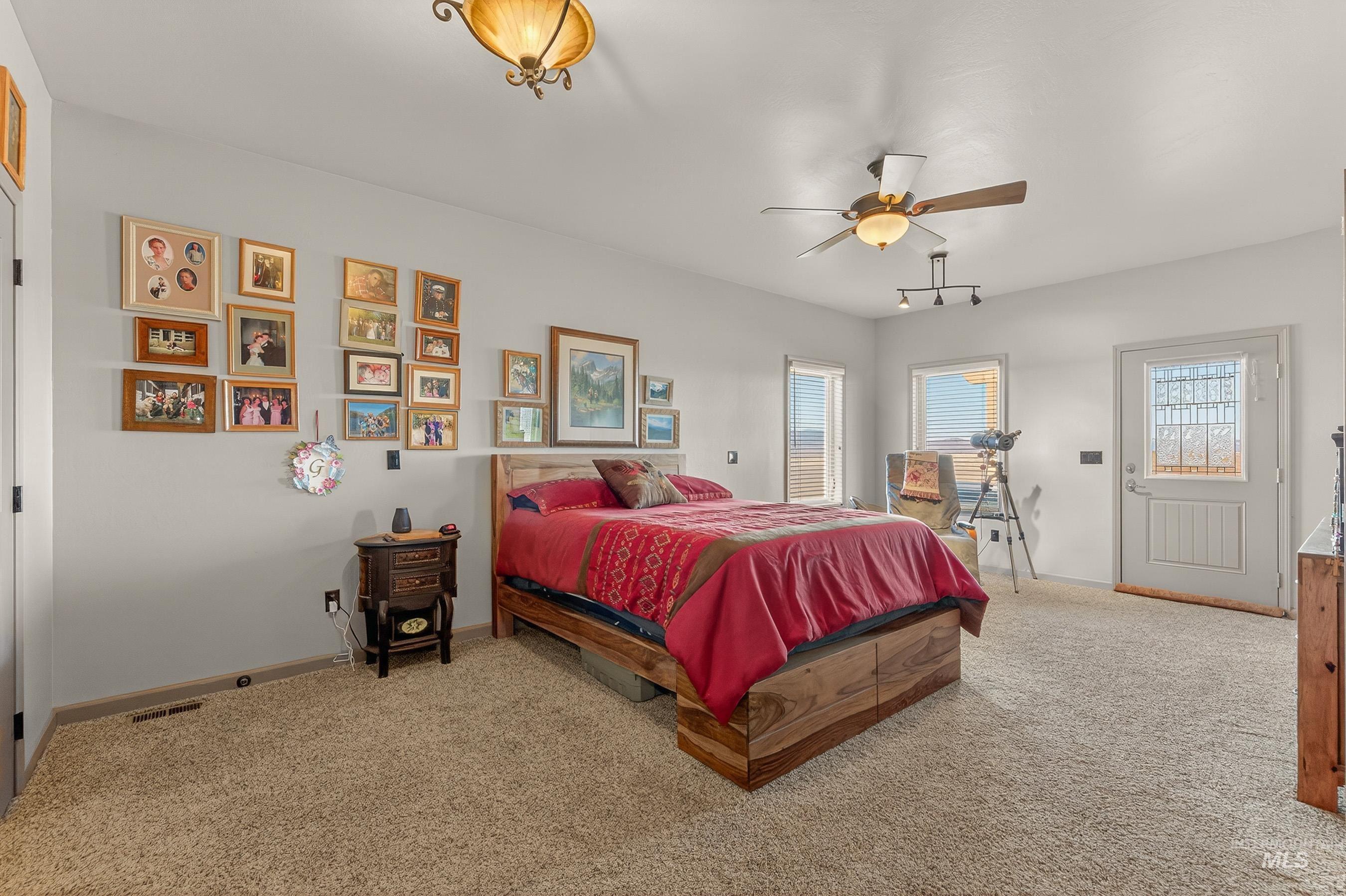 2195 Kilborn Lane Mesa, ID 83643 - Photo 22 of 50 Bedroom featuring light colored carpet and ceiling fan