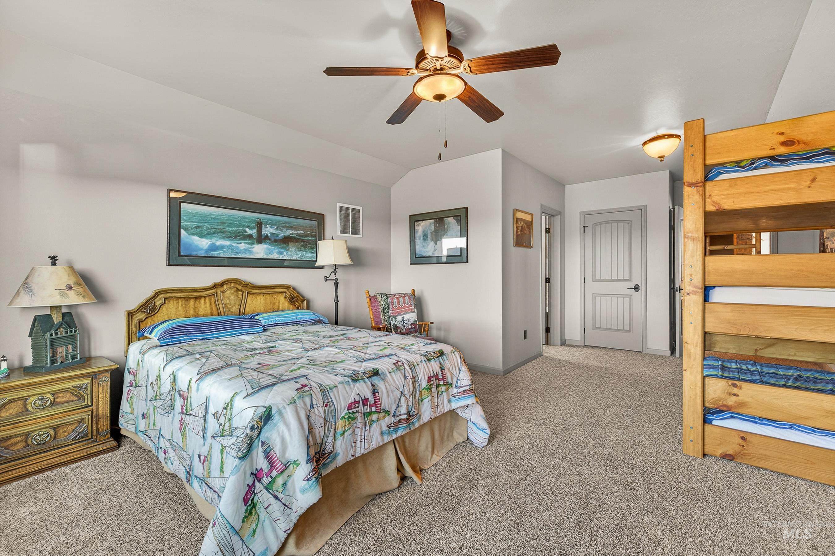 2195 Kilborn Lane Mesa, ID 83643 - Photo 28 of 50 Bedroom featuring carpet, ceiling fan, and vaulted ceiling