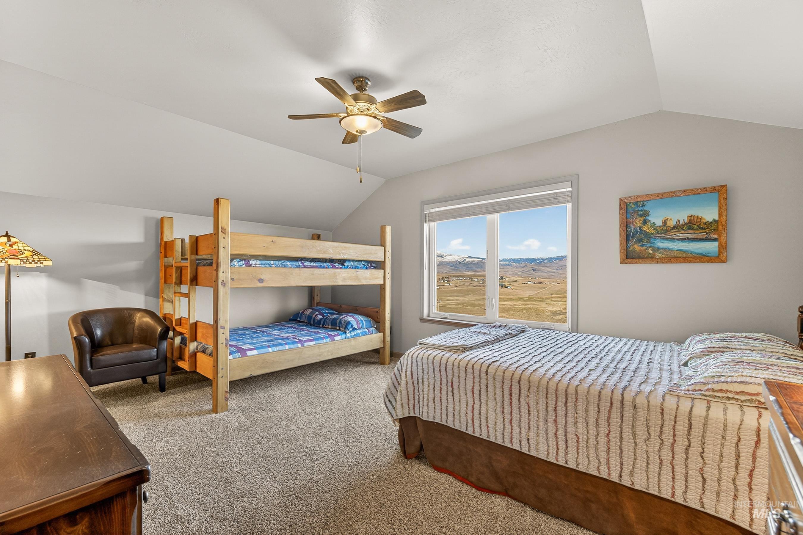 2195 Kilborn Lane Mesa, ID 83643 - Photo 32 of 50 Carpeted bedroom featuring lofted ceiling and ceiling fan