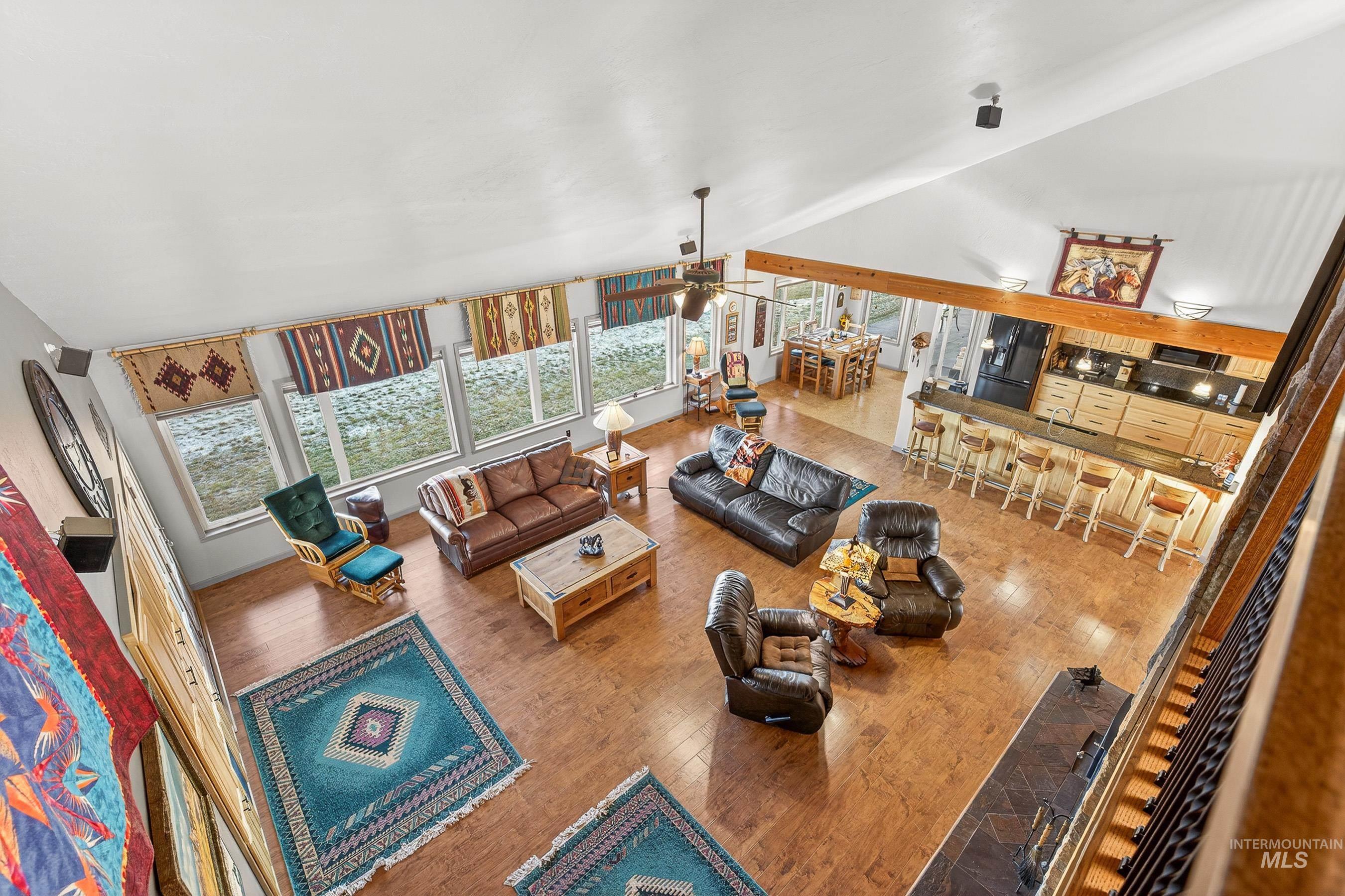 2195 Kilborn Lane Mesa, ID 83643 - Photo 34 of 50 Living room featuring light wood-style floors and vaulted ceiling