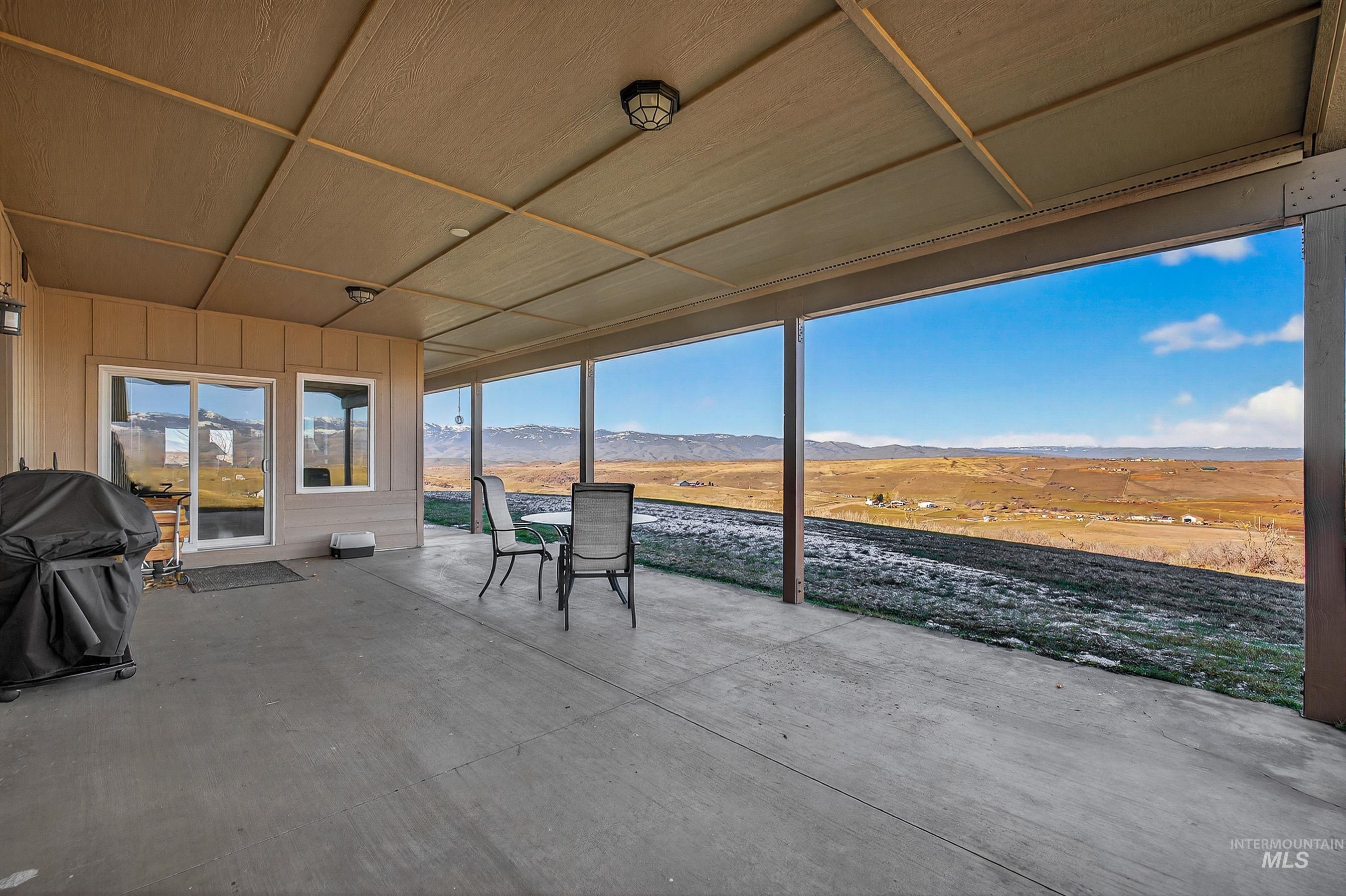 2195 Kilborn Lane Mesa, ID 83643 - Photo 45 of 50 View of patio / terrace with a mountain view and area for grilling