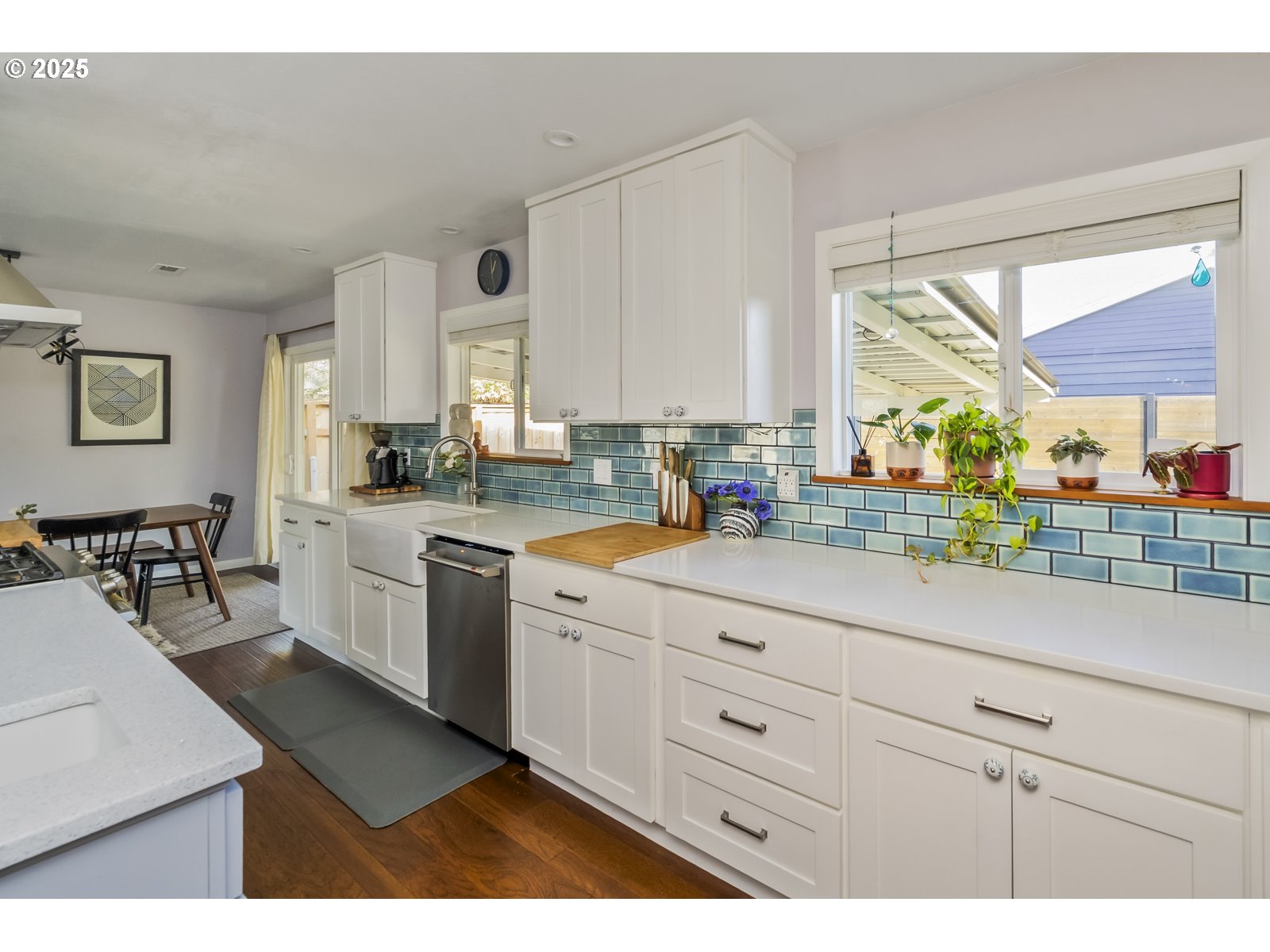 4642 Southeast 31st Avenue Portland, OR 97202 - Photo 10 of 45 a kitchen with sink cabinets and window