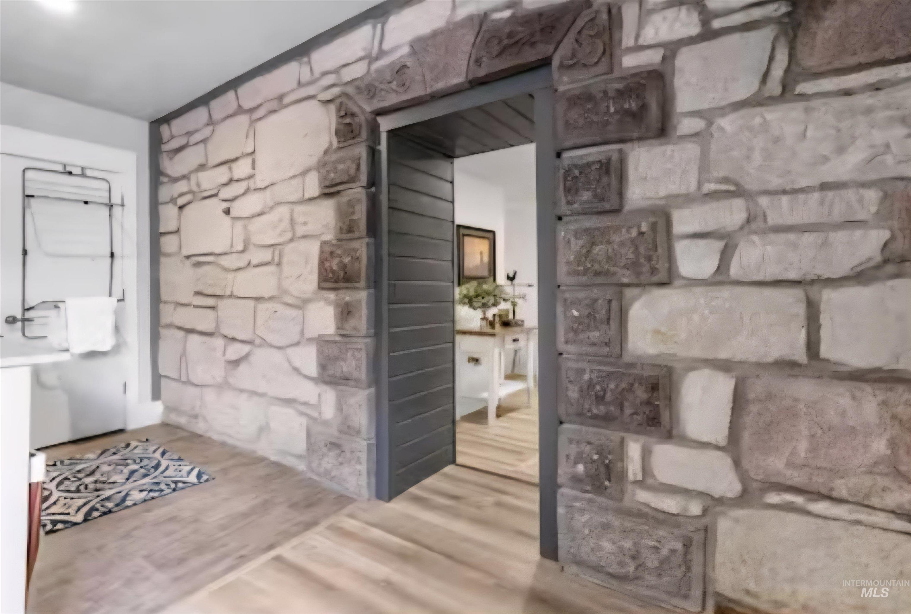 150 West Main Street Oakley, ID 83346 - Photo 36 of 49 Wine area with wood finished floors