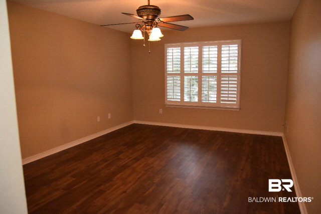229 Spring Lake Drive Fairhope, AL 36532 - Photo 7 of 21 Master Bedroom is located in the back of home, near the lake.