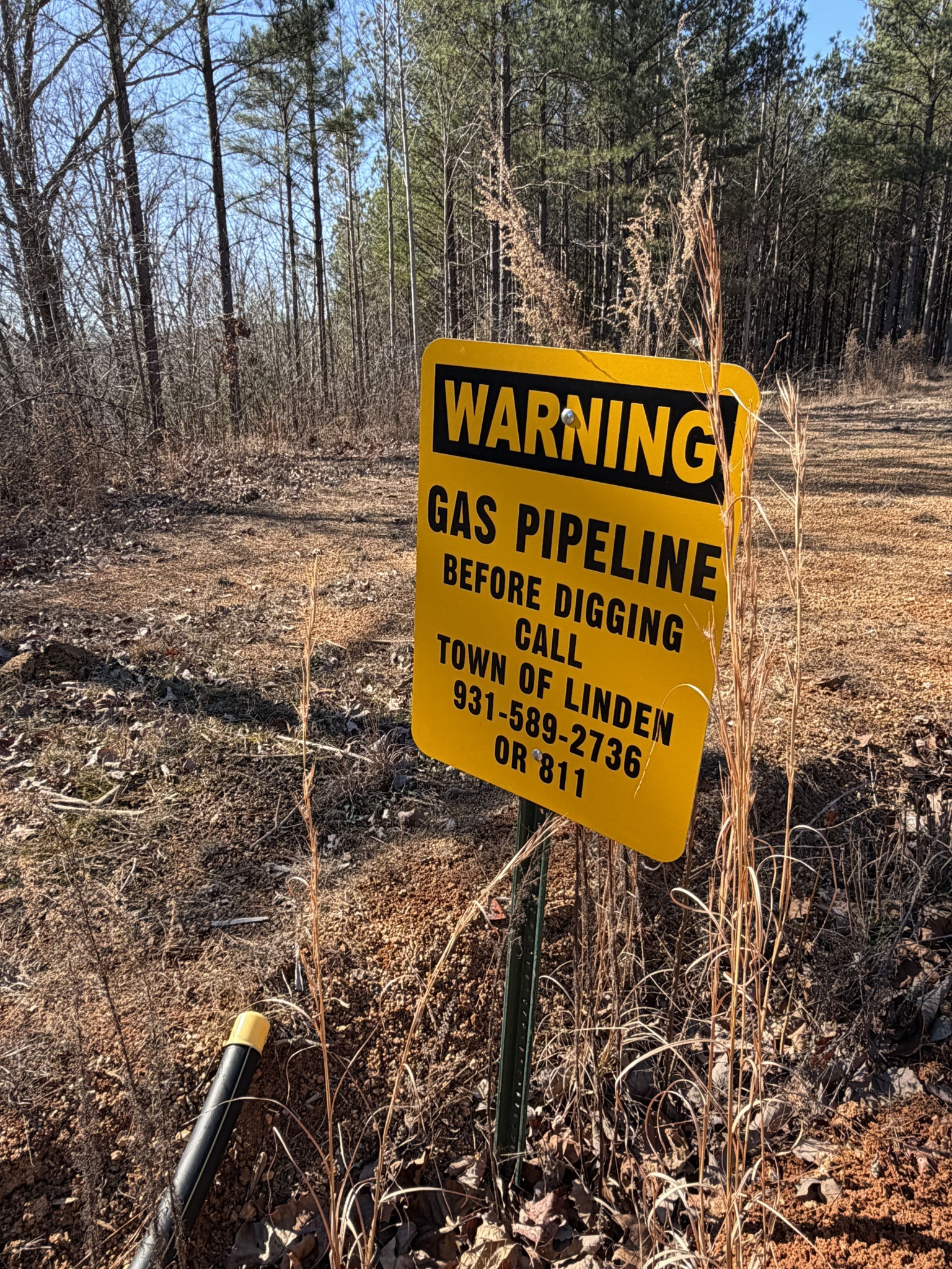 533 Center Ridge Drive Linden, TN 37096 - Photo 14 of 19 a sign on the side of the road