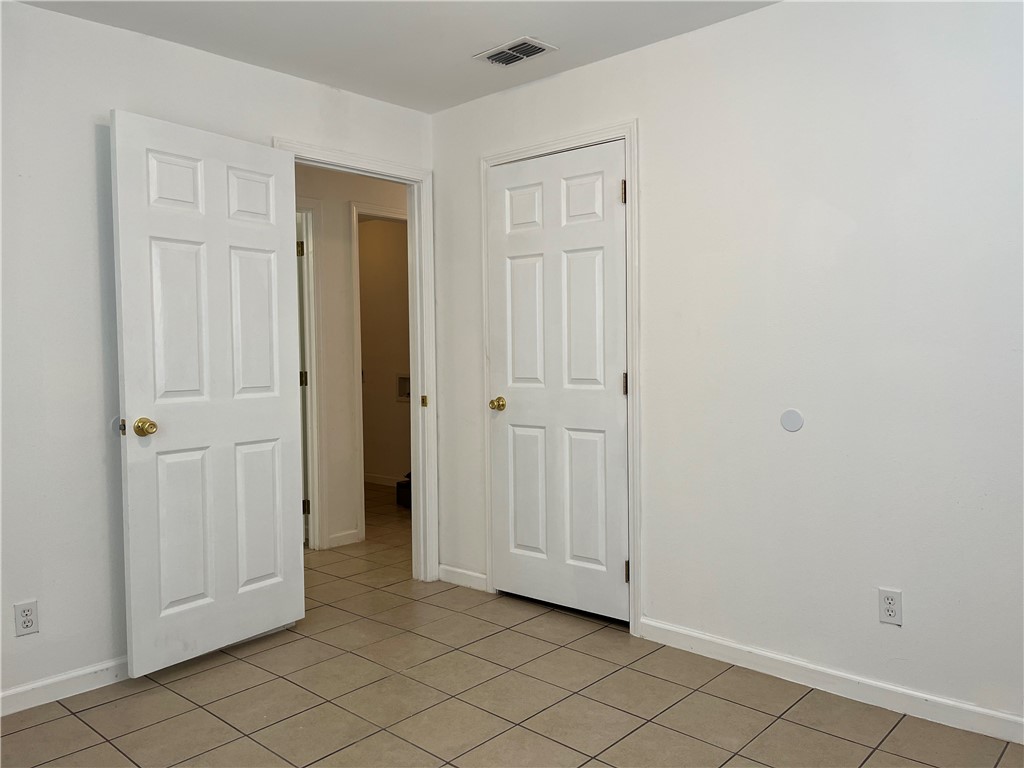 629 Lopez Street Taft, TX 78390 - Photo 18 of 22 an empty room with windows