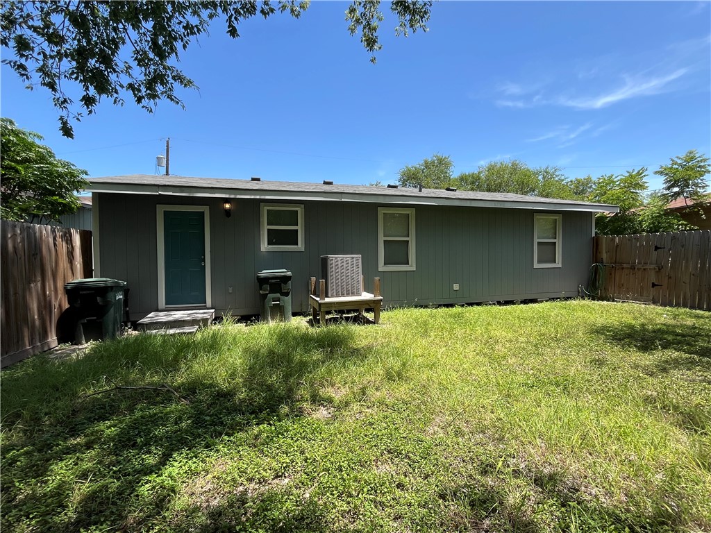 629 Lopez Street Taft, TX 78390 - Photo 22 of 22 a backyard of a house with table and chairs