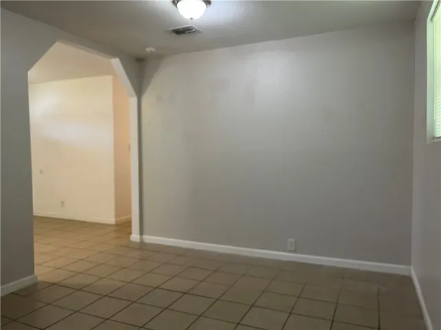 a bathroom with bathtub and shower