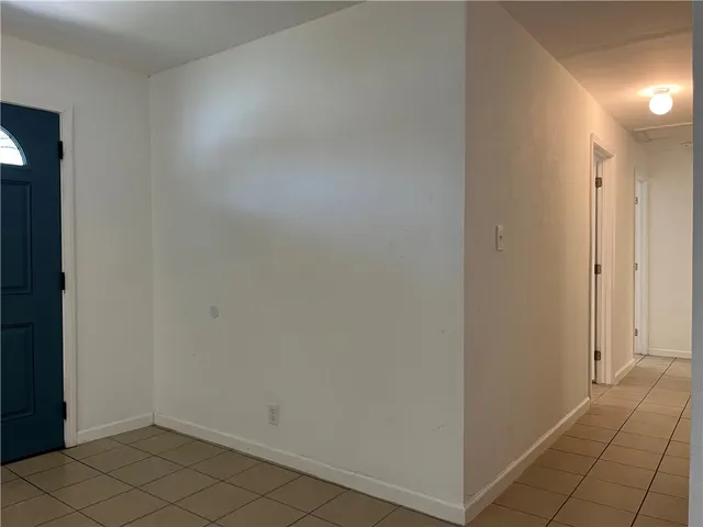 a bathroom with a double vanity sink mirror and