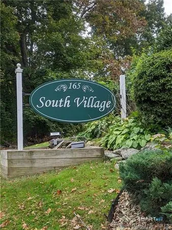a sign broad on the side of the road