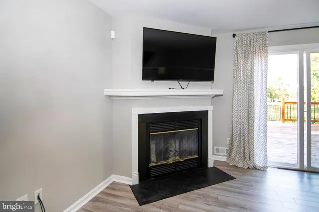 a kitchen with stainless steel appliances and wooden cabinets