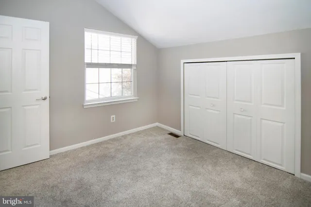 an empty room with closet