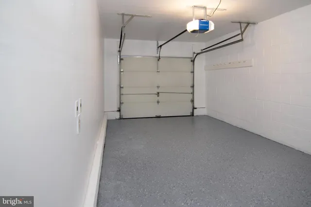 a view of a chairs and table on the wooden floor