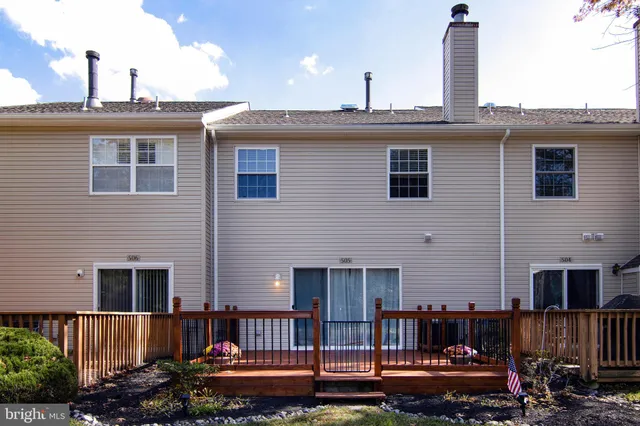 a view of a tree in a yard