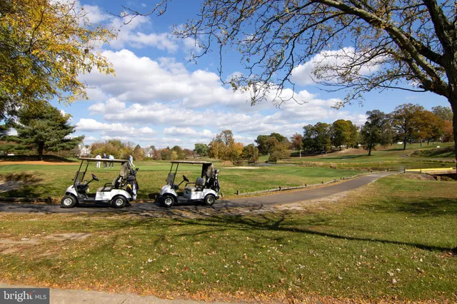a view of a playground with basketball court