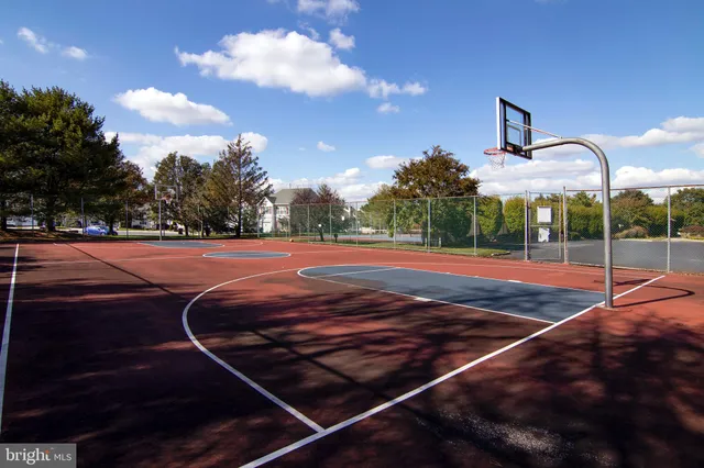 a view of street with parked cars
