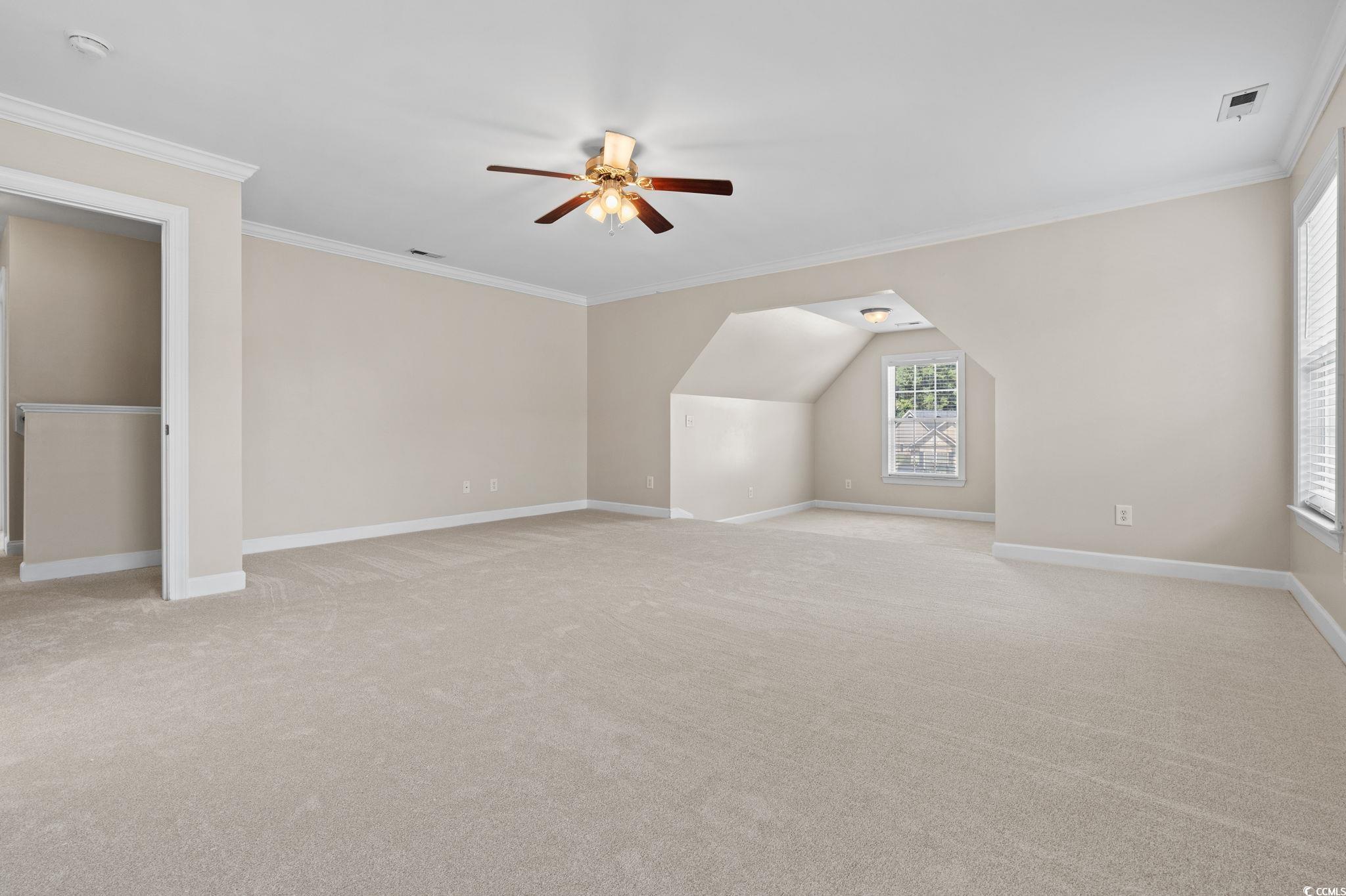 181 Dunbarton Lane Conway, SC 29526 - Photo 20 of 40 Bonus room with light carpet and ceiling fan