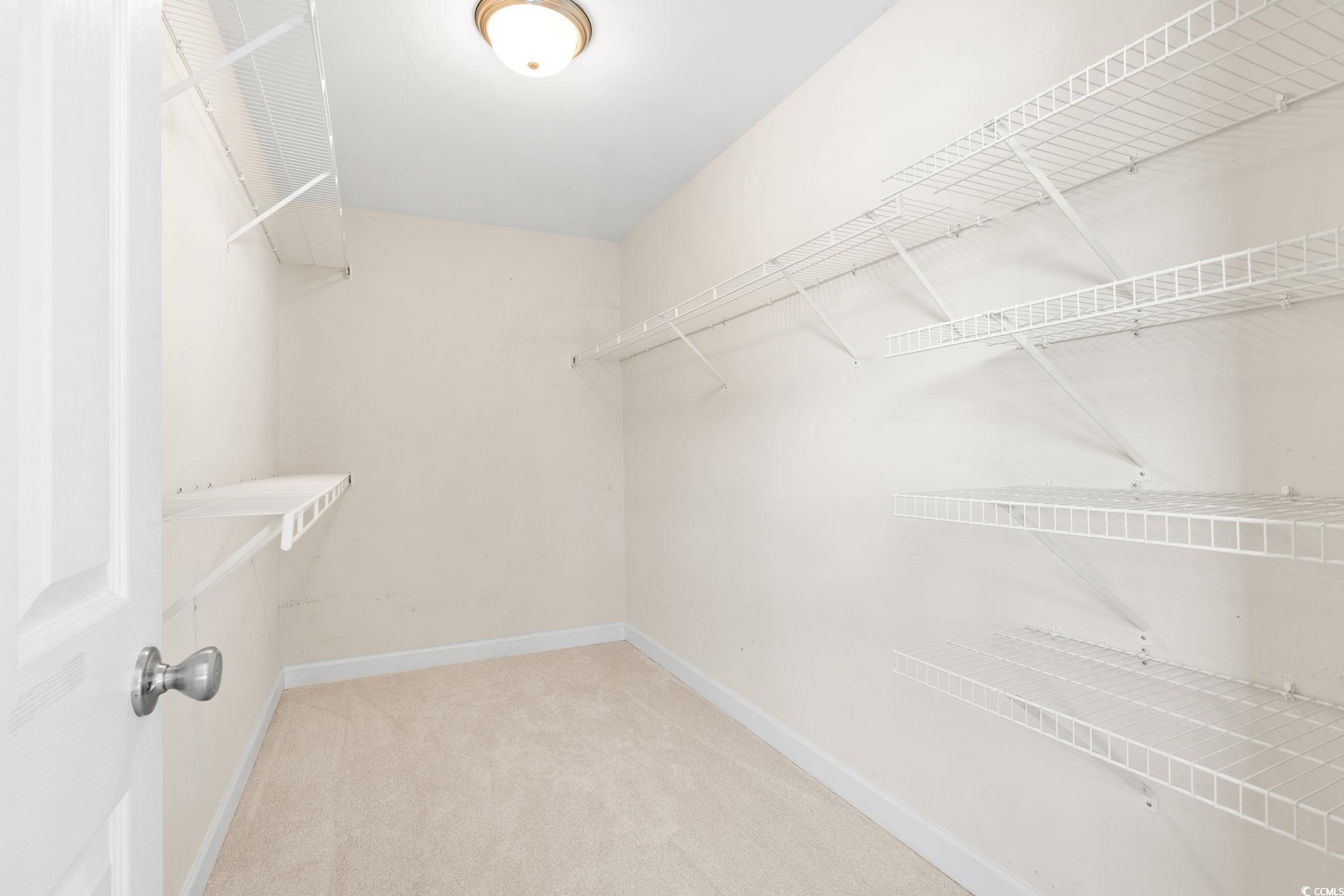181 Dunbarton Lane Conway, SC 29526 - Photo 26 of 40 Spacious closet featuring light colored carpet