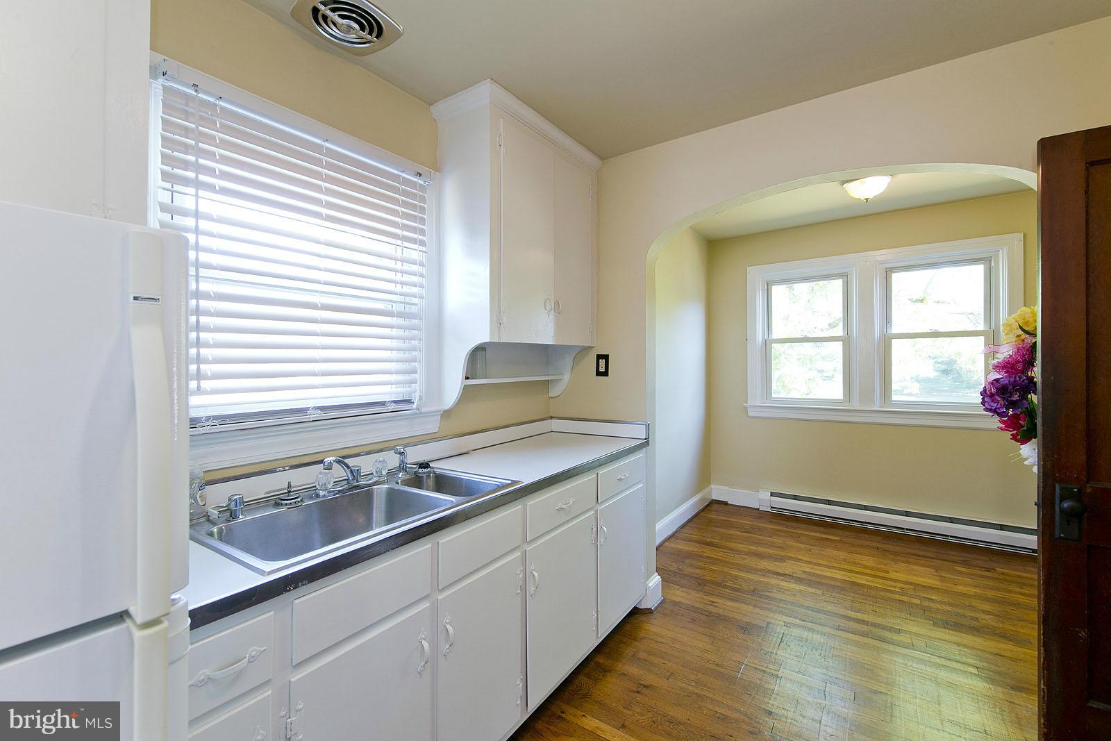 2244 Strasburg Road Front Royal, VA 22630 - Photo 11 of 30 a bathroom with a sink and a window