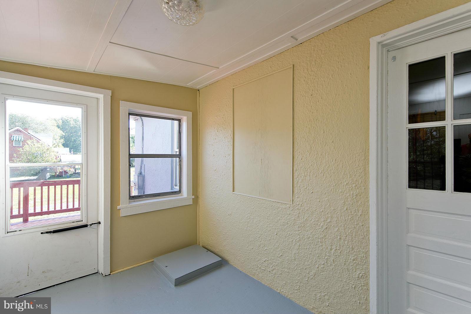 2244 Strasburg Road Front Royal, VA 22630 - Photo 26 of 30 an empty room with windows