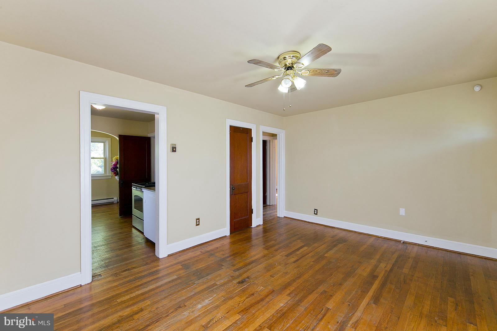 2244 Strasburg Road Front Royal, VA 22630 - Photo 8 of 30 a view of an empty room with wooden floor