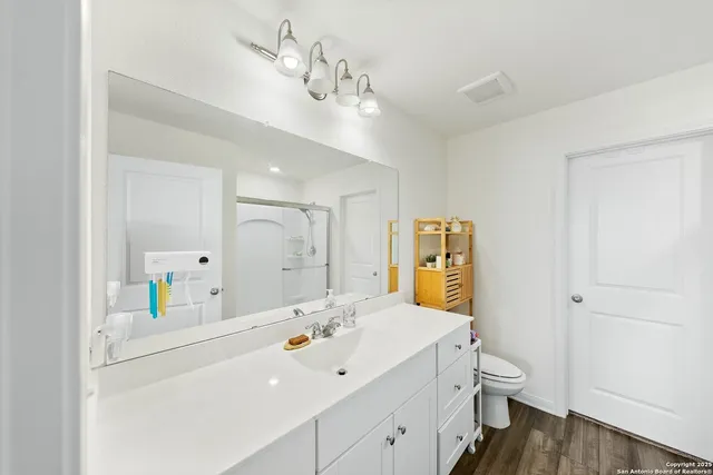 a view of a workspace with furniture