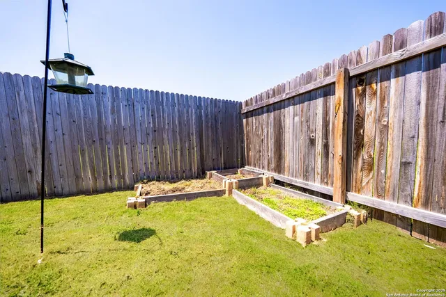a house view with swimming pool in front of it