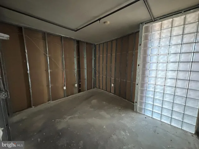 a view of a bathroom with a shower and a tub