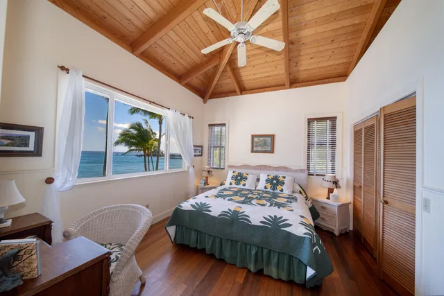 a bedroom with a bed and a view of bathroom