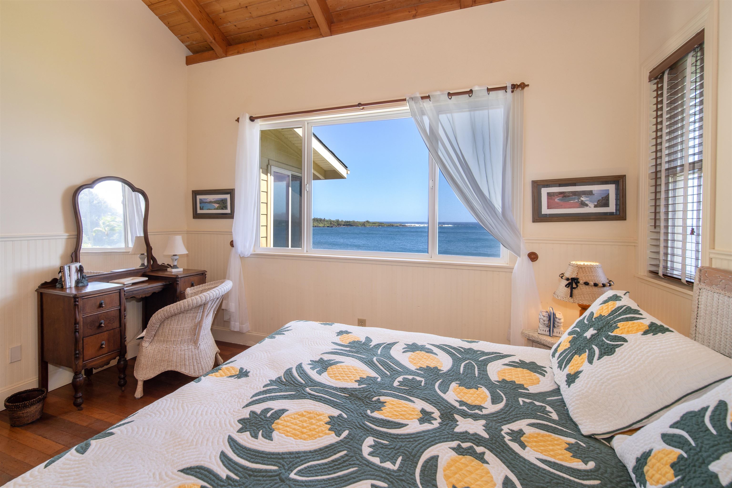 4955 Uakea Road Hana, HI 96713 - Photo 18 of 36 a bedroom with bed and a window