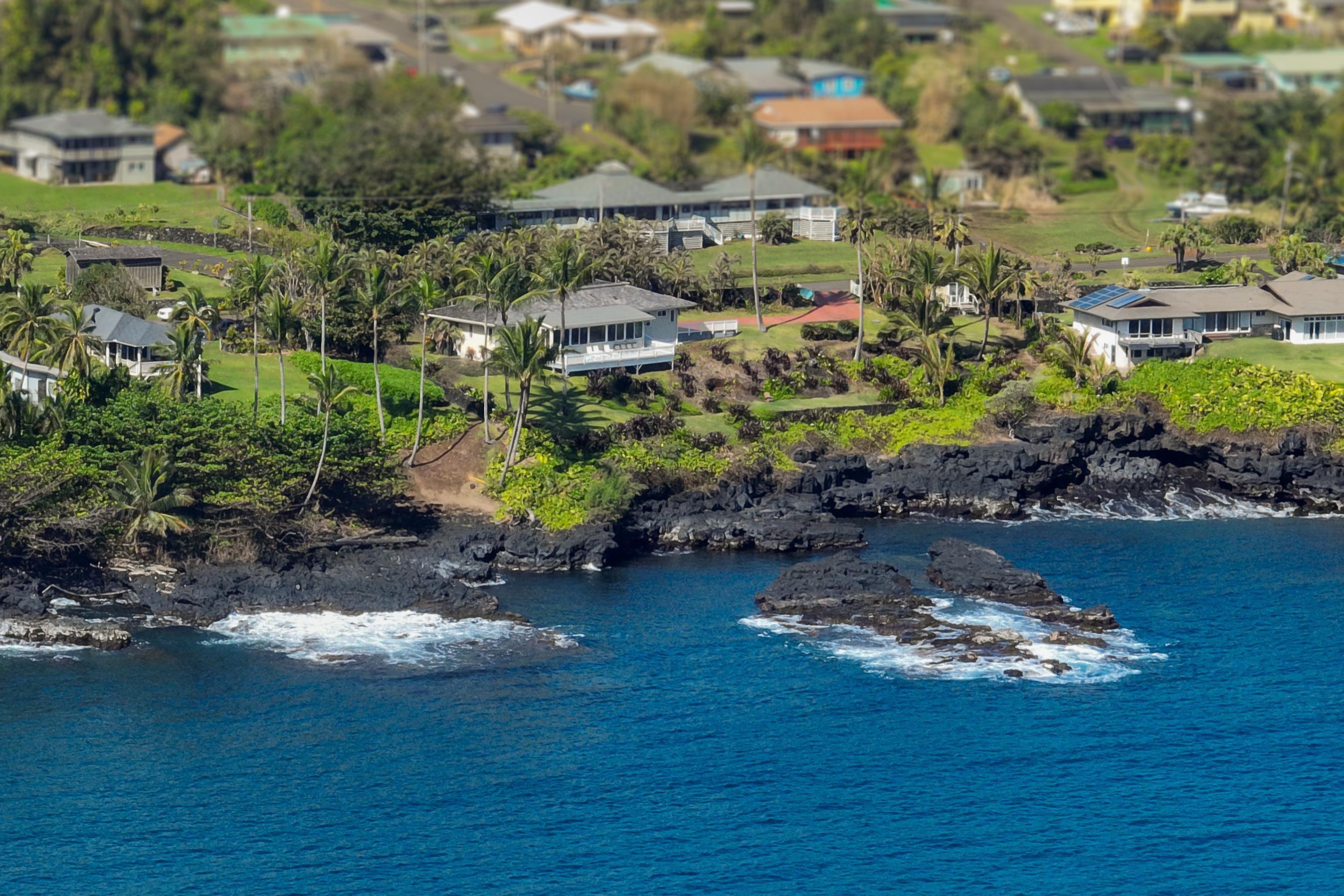 4955 Uakea Road Hana, HI 96713 - Photo 36 of 36 a view of a lake with a mountain