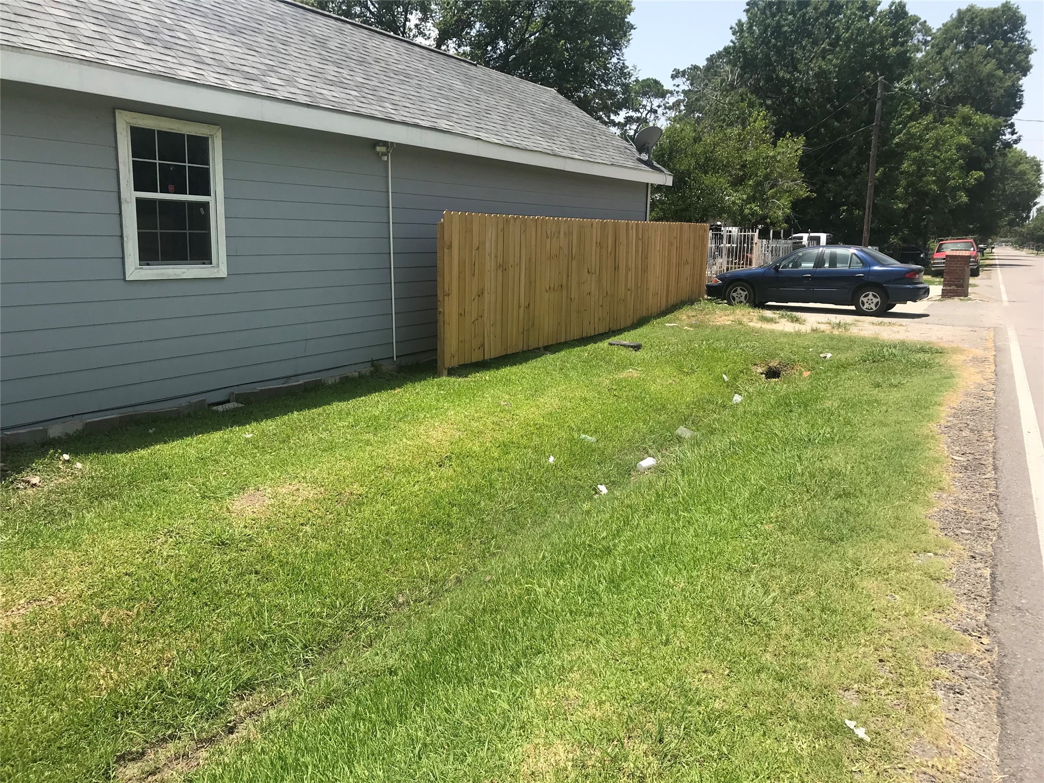1202 Manor Street Houston, TX 77015 - Photo 2 of 3 a view of a backyard with a cabin