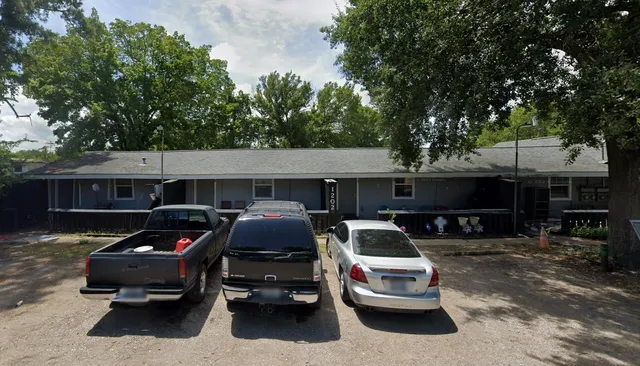 a car parked in front of a house