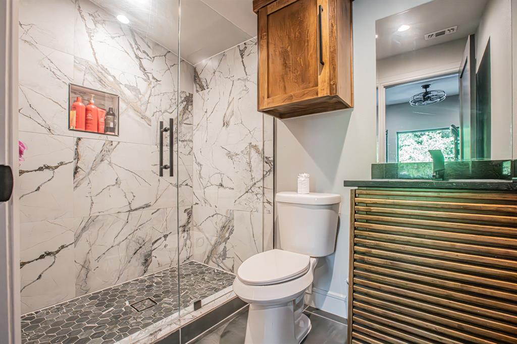 3100 East Melissa Road Melissa, TX 75454 - Photo 21 of 39 Full bathroom featuring toilet and a marble finish shower