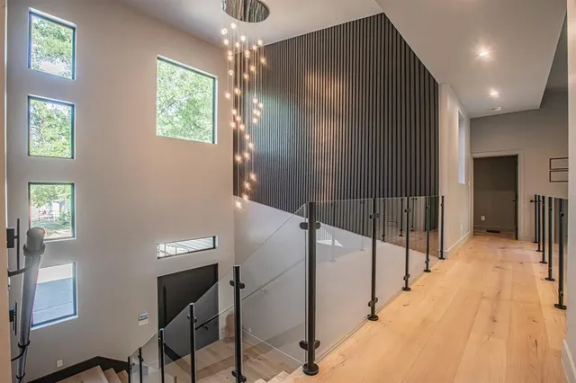 a view of a hallway with windows