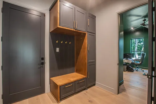 a workspace with furniture and a window