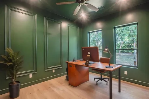 a view of an empty room with a balcony