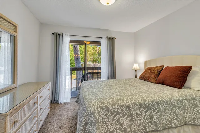 a view of a garden with a house