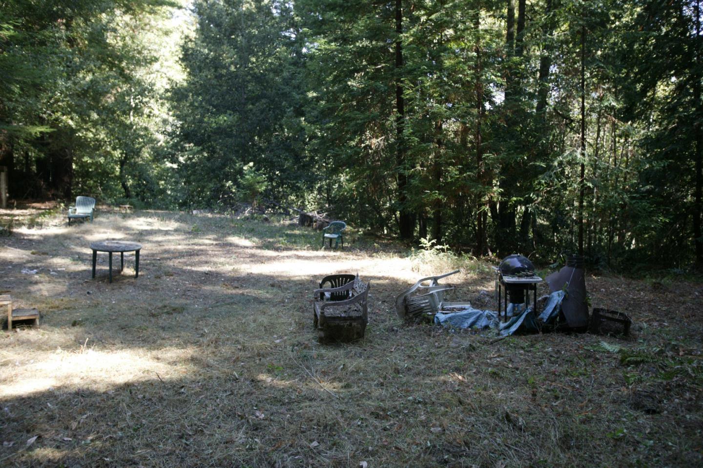 0 Fern Flat Road Aptos, CA 95003 - Photo 2 of 3 a backyard of a house with fire pit and trees