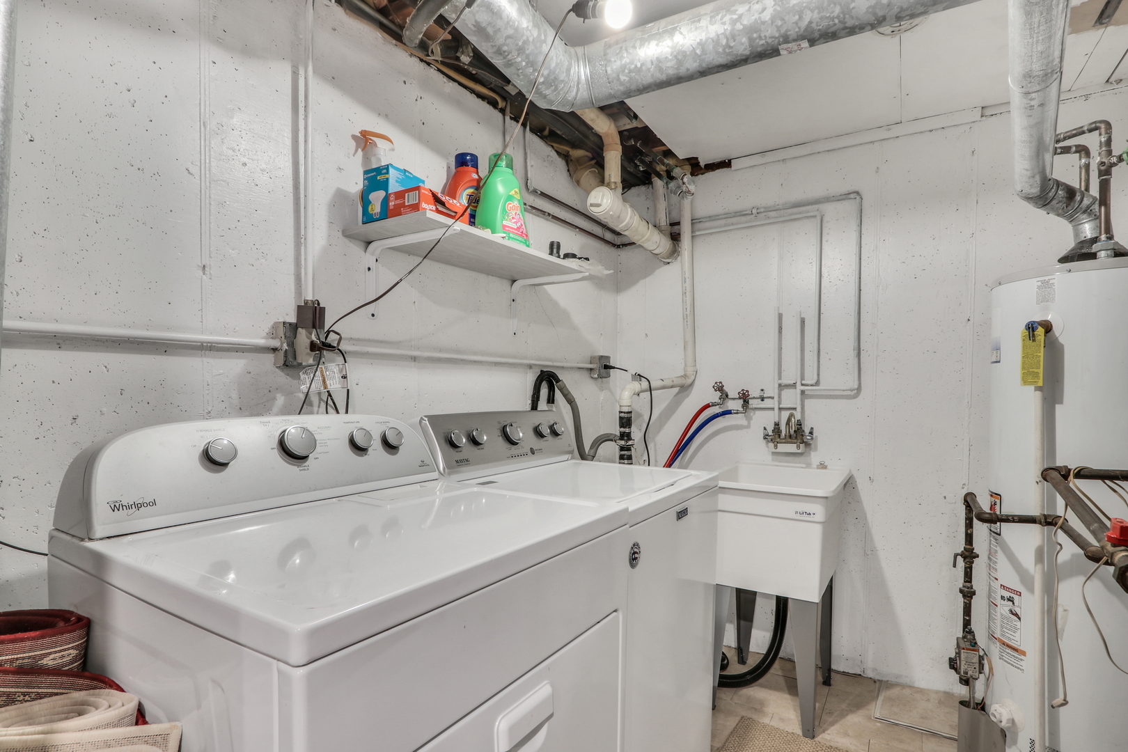 1038 Inverrary Lane Deerfield, IL 60015 - Photo 19 of 19 a utility room with dryer and washer
