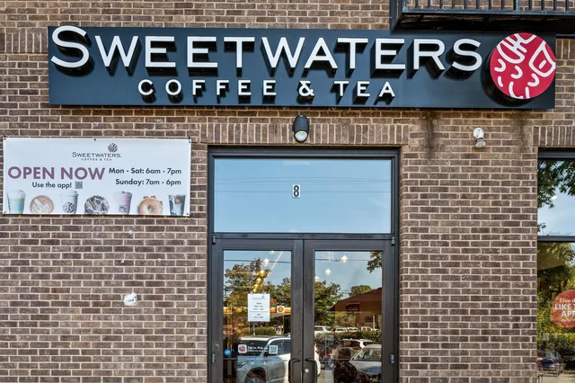 a front view of a building with a street