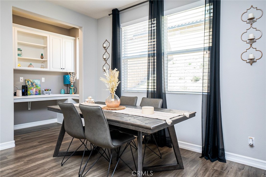 4788 Condor Avenue Fontana, CA 92336 - Photo 12 of 49 a view of a dining room with furniture window and wooden floor