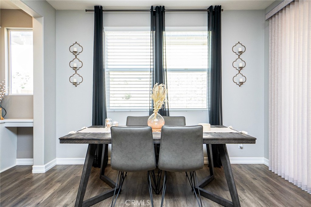 4788 Condor Avenue Fontana, CA 92336 - Photo 17 of 49 a view of a dining room with furniture window and wooden floor