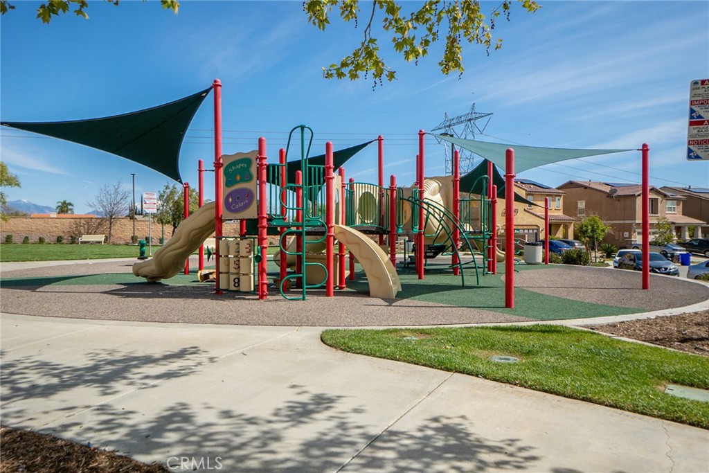 4788 Condor Avenue Fontana, CA 92336 - Photo 47 of 49 a view of a park with swings and slides